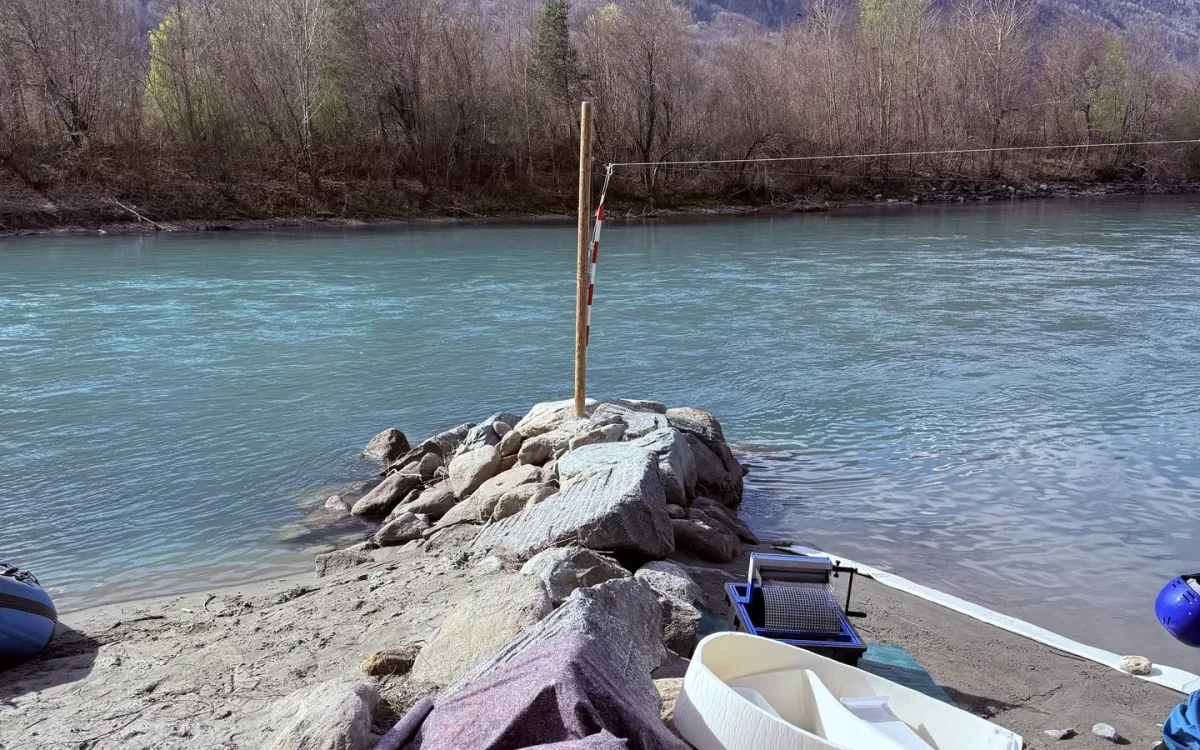White FoamFlex absorbent materials and bags on the rocks of a river bank